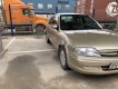 Ford Laser 2001 - Bán xe Ford Laser sản xuất năm 2001, màu vàng xe gia đình