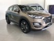 Hyundai Tucson   2019 - Bán xe Hyundai Tucson 1.6 Turbo đời 2019, màu nâu vàng giá cạnh tranh