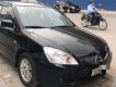 Mitsubishi Lancer     2004 - Cần bán Mitsubishi Lancer năm sản xuất 2004, nhập khẩu số tự động