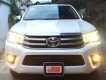Toyota Hilux 2016 - Cần bán lại xe Toyota Hilux đời 2016, màu trắng, nhập khẩu nguyên chiếc