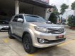 Toyota Fortuner G 2015 - Cần bán xe Toyota Fortuner G sản xuất 2015, màu bạc, chạy ít 88.900km giá còn fix mạnh