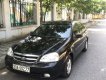 Daewoo Lacetti 2010 - Cần bán xe Daewoo Lacetti đời 2010, màu đen, xe gia đình sử dụng ít 