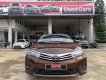 Toyota Corolla altis 1.8G 2014 - Bán Toyota Corolla altis 1.8G đời 2014, màu nâu, giá tốt