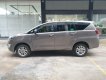 Toyota Innova E 2019 - Cần bán Toyota Innova E 2019 màu đồng ánh kim, lướt 11.000km siêu đẹp