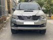 Toyota Fortuner 2016 - Gia đình cần bán xe Toyota Fotuner 2016, số sàn, màu bạc