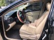 Toyota Camry 2.0E 2013 - Cần bán Toyota Camry 2.0E đời 2013, màu đen giá thương lượng