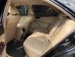 Toyota Camry 2.0E 2013 - Cần bán Toyota Camry 2.0E đời 2013, màu đen giá thương lượng