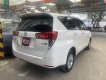 Toyota Innova 2016 - Bán ô tô Toyota Innova 2.0E sản xuất 2016, màu trắng biển SG đẹp long lanh - giá còn fix