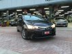 Toyota Corolla altis 1.8G MT 2014 - Cần bán lại xe Toyota Corolla altis 1.8G MT đời 2014, màu đen