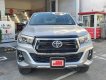 Toyota Hilux   2019 - Cần bán gấp Toyota Hilux 2.8 4x4 số tự động đời 2019, màu bạc lướt 17000km giá cực tốt