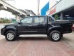 Toyota Hilux 2014 - Cần bán xe Toyota Hilux E MT đời 2014, màu đen, nhập khẩu biển SG - giá cực tốt