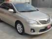 Toyota Corolla altis 2013 - Cần bán xe Toyota Corolla Altis 1.8G năm 2013, màu vàng cát, biển SG - đúng chất 54.000km