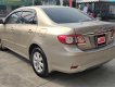 Toyota Corolla altis 2013 - Cần bán xe Toyota Corolla Altis 1.8G năm 2013, màu vàng cát, biển SG - đúng chất 54.000km