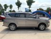 Toyota Innova 2.0E 2018 - Cần bán xe Toyota Innova 2.0E sản xuất 2018, màu đồng ánh kim, biển SG - 74.000km, gia đình xem xe thương lượng