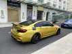 BMW M4   2017 - Bán ô tô BMW M4 đời 2017, màu vàng, xe nhập còn mới