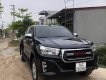 Toyota Hilux   2.4E 4x2 AT  2018 - Bán ô tô Toyota Hilux 2.4E 4x2 AT sản xuất năm 2018, màu đen, nhập khẩu còn mới