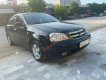 Daewoo Lacetti   EX 2010 - Cần bán gấp Daewoo Lacetti EX năm 2010, màu đen  