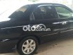 Kia Spectra 2004 - Bán ô tô Kia Spectra đời 2004, màu đen