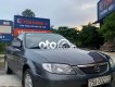 Mazda 323    2001 - Cần bán xe Mazda 323 đời 2001, màu xám, xe nhập còn mới