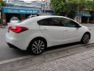 Kia K3   MT 2014 - Bán Kia K3 MT đời 2014, màu trắng chính chủ, giá chỉ 359 triệu