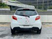 Mazda 2    2013 - Cần bán gấp Mazda 2 đời 2013, màu trắng còn mới