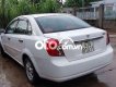 Daewoo Lacetti 2011 - Cần bán gấp Daewoo Lacetti năm 2011, màu trắng, giá chỉ 165 triệu