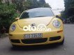 Volkswagen New Beetle   2007 - Cần bán xe Volkswagen New Beetle sản xuất 2007, màu vàng, nhập khẩu nguyên chiếc