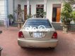 Ford Laser    2002 - Cần bán gấp Ford Laser 2002, màu vàng