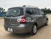 Nissan Grand livina 2011 - Cần bán gấp Nissan Grand livina 2011, màu xám