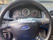 Ford Laser    2002 - Cần bán gấp Ford Laser 2002, màu vàng