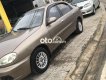 Daewoo Lanos 2002 - Cần bán Daewoo Lanos đời 2002, màu nâu, nhập khẩu nguyên chiếc, giá tốt