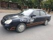Daewoo Nubira 2002 - Bán ô tô Daewoo Nubira sản xuất 2002, màu đen còn mới giá cạnh tranh