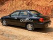 Kia Spectra    2005 - Bán Kia Spectra sản xuất năm 2005, màu đen, xe nhập