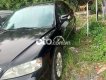 Ford Mondeo 2004 - Bán Ford Mondeo đời 2004, màu đen còn mới, 125tr