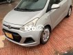 Hyundai Grand i10 2016 - Cần bán gấp Hyundai Grand i10 đời 2016, màu bạc còn mới