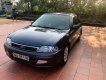 Ford Laser   Deluxe 1.6 MT 2002 - Xe Ford Laser Deluxe 1.6 MT năm 2002, màu xám