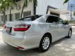 Toyota Camry   2.0E 2015 - Bán ô tô Toyota Camry 2.0E sản xuất năm 2015, màu bạc, 670 triệu