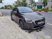 Mazda 2   1.5 AT  2016 - Cần bán lại xe Mazda 2 1.5 AT năm sản xuất 2016, màu xám