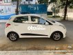 Hyundai Grand i10   2016 - Cần bán lại xe Hyundai Grand i10 2016, màu trắng còn mới