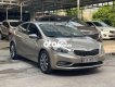 Kia K3 2014 - Bán Kia K3 2014, màu nâu còn mới giá cạnh tranh