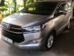 Toyota Innova   2.0E   2016 - Bán Toyota Innova 2.0E năm sản xuất 2016, màu bạc xe gia đình