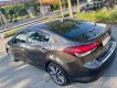 Kia Cerato   2.0 2016 - Bán xe Kia Cerato 2.0 đời 2016, màu nâu còn mới, giá chỉ 486 triệu