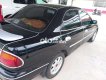 Mazda 323 1999 - Cần bán lại xe Mazda 323 năm 1999, màu đen, xe nhập, 130 triệu