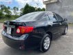 Toyota Corolla 1.8MT 2009 - Bán Toyota Corolla 1.8MT đời 2009, màu đen còn mới