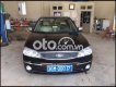 Ford Laser    2005 - Bán xe Ford Laser năm 2005, màu đen, xe nhập còn mới, 130tr