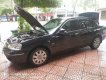 Ford Laser   GHIA 1.8 AT  2005 - Bán ô tô Ford Laser GHIA 1.8 AT sản xuất 2005, màu đen giá cạnh tranh