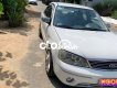 Ford Laser 2004 - Cần bán gấp Ford Laser năm sản xuất 2004, màu trắng còn mới, 145tr