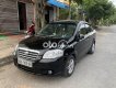 Daewoo Gentra 2009 - Cần bán xe Daewoo Gentra 2009, màu đen xe gia đình