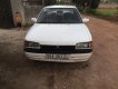 Mazda 323   1.6 MT   1995 - Cần bán gấp Mazda 323 1.6 MT 1995, màu trắng, giá tốt