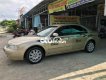 Ford Mondeo 2004 - Bán Ford Mondeo năm 2004, màu vàng, nhập khẩu còn mới